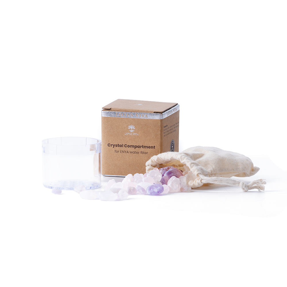 The Lotus Vita Crystal Holder packaging, the transparent holder, and the included rose quartz and amethyst gemstones for water vitalization.